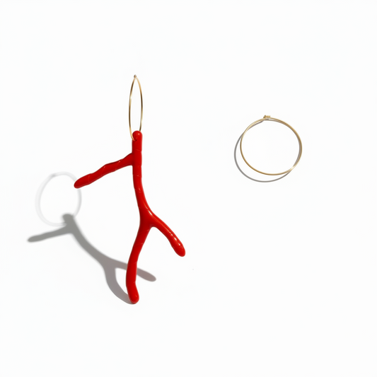 Cose E Bijoux Pantelleria gold hoop earrings with a large red resin coral branch pendant for a summer vacation look.