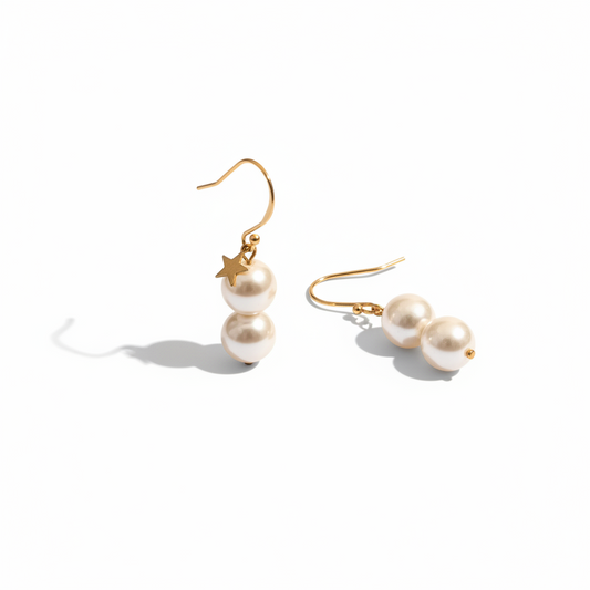 Cose E Bijoux Riviera earrings with Mallorca pearls, gold-plated 925 silver hooks, and a small star charm detail.